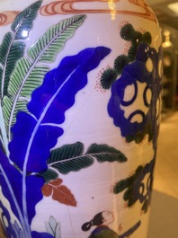 A pair of Chinese wucai rouleau vases, 19th C.